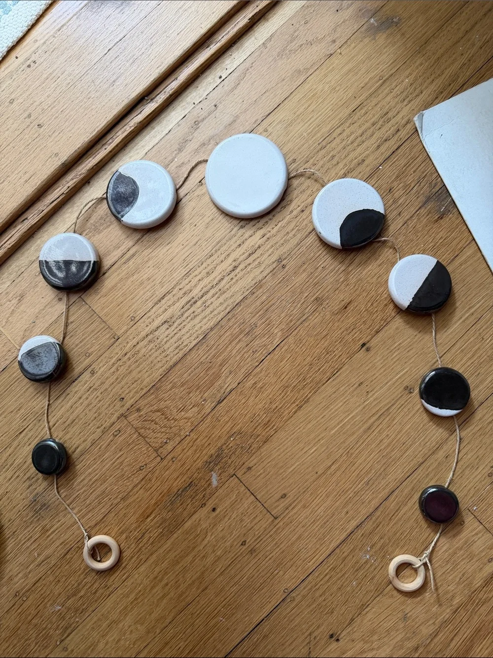 Urban Outfitters Ceramic Moon Phase Garland in White and Black